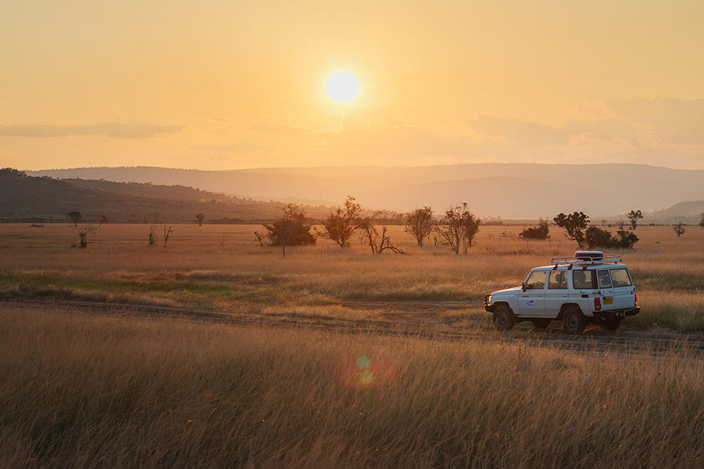 Tourists on a game drive in Akagera