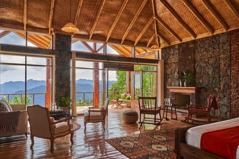 A luxury lodge room with a view of the Bwindi forest